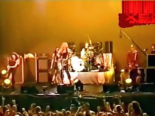 Fuck-hole's Courtney Love In Sans Bra On Stage At The Big Day...